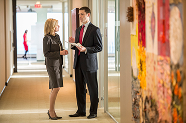 discussion-in-the-corridor-370x246